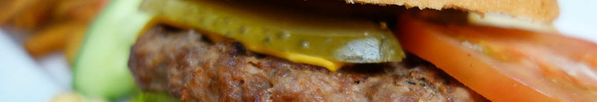 Eating Burger at Lebowski's Grill at Highland Lanes restaurant in Austin, TX.